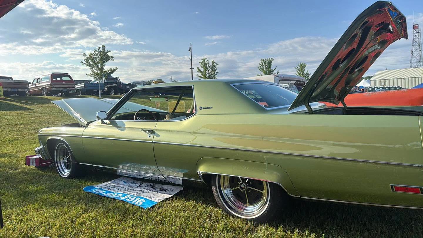 Side profile of the Leaf Green Buick Electra on the show field